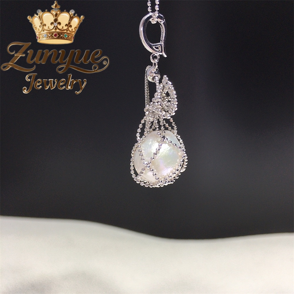 Colgante barroco de perlas de  - Luxury Bags To Sell reseña y precio